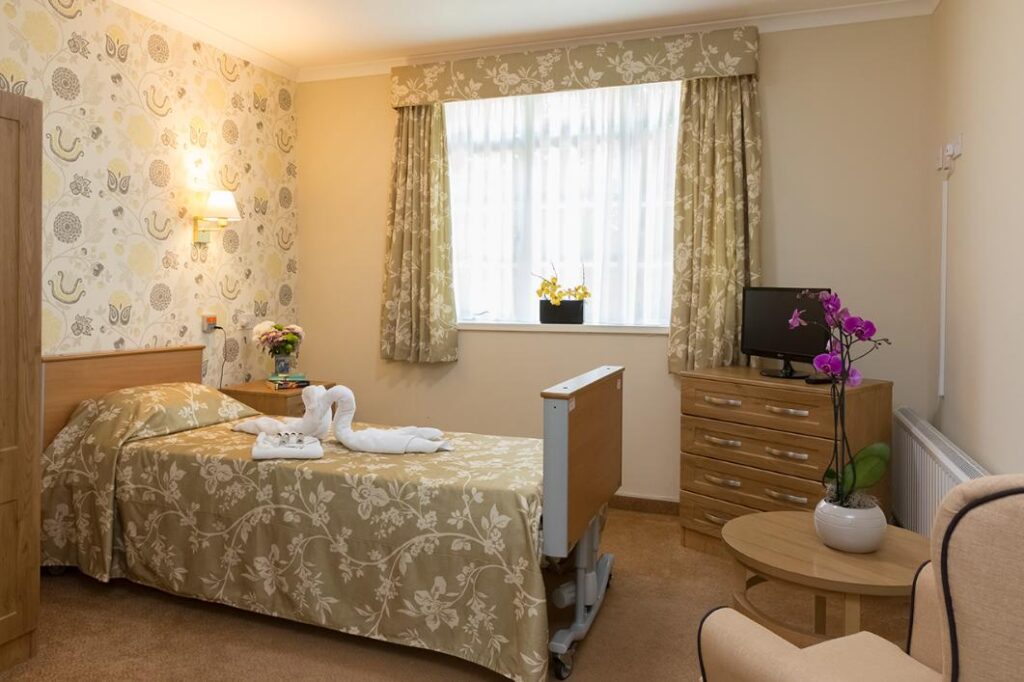 bedroom decorated with yellow floral textiles
