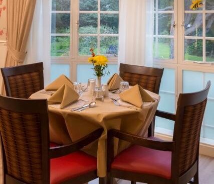 dining table next to window in care home