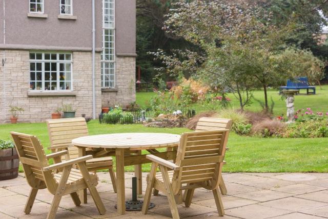picnic table and chairs on care home patio