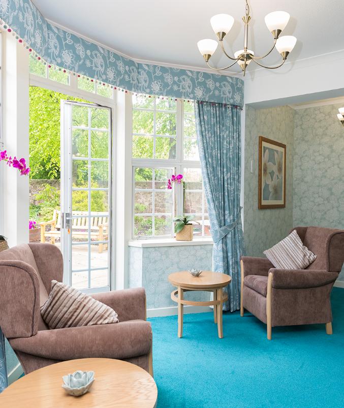 living area with patio doors in colinton care home